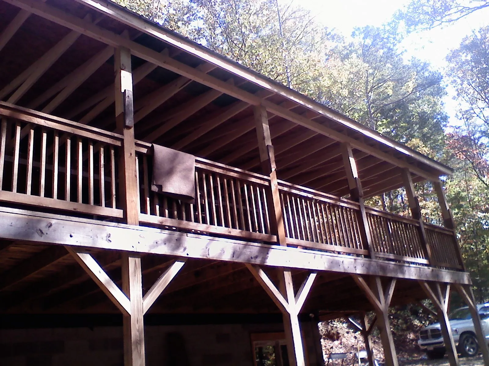 Timber framing under a new elevated porch and deck — Roof Leak Repair in Lewistown by Roofing Brothers